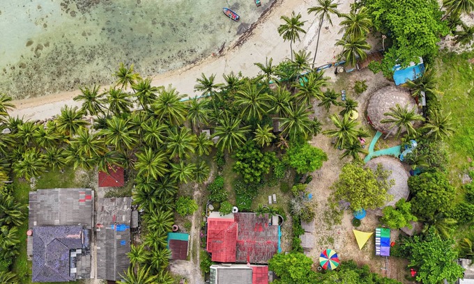 Taling Ngam Villa | Experience serene sunsets, private beach access, and tropical luxury in this renovated Thai house.