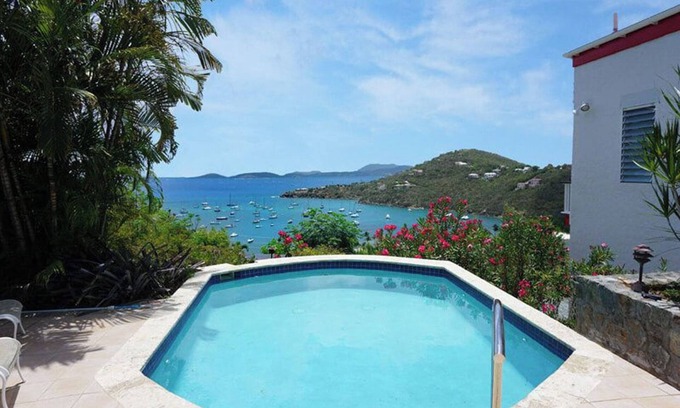 Estate Chocolate Hole and Great Cruz Bay Villa | Experience the enchanting allure of La Collina – a stunning home that boasts breathtaking sunset views & ocean views, a refreshing pool, and air conditioning. Elevate your lifestyle in this picturesque retreat!