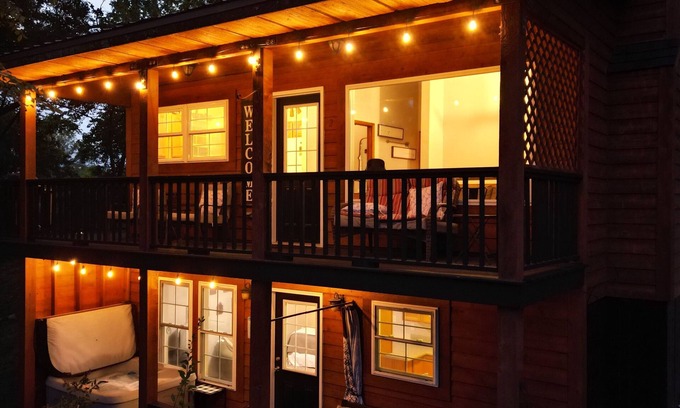 Cobden Cabin | Exquisite views of Shawnee National Forest seen from a private, covered hot tub.