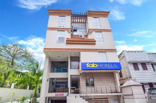 Ram Nagar Hotel | FabHotel ESS Paradise - Nr Bus stand