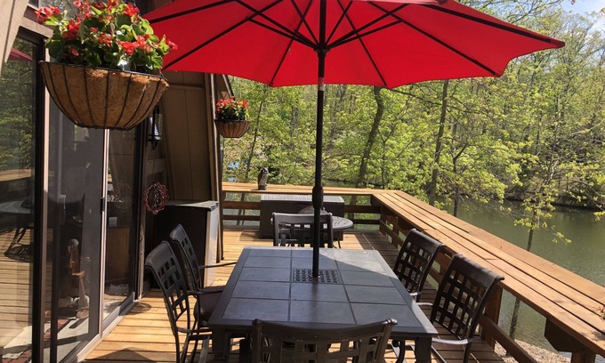 Innsbrook Cabin | Fabulous chalet surrounded by a lake with rocked shoreline for water fun!