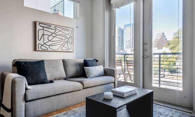 Waller Creek District Apartment | Fabulous Downtown Studio w/Deck & Gym, nr Offices, by Blueground