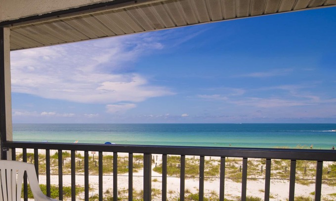 Bradenton Beach Condo | Family beach condo. Steps to sand and restaurants + bars!