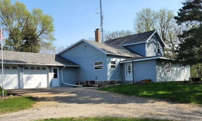 Faribault County House | Family cottage nestled along the woods & river