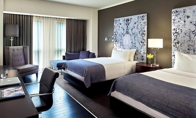 West Plaza Hotel | Family Getaway! 2 Spacious Units, Pool, Pets Allowed Near Rockhurst University!