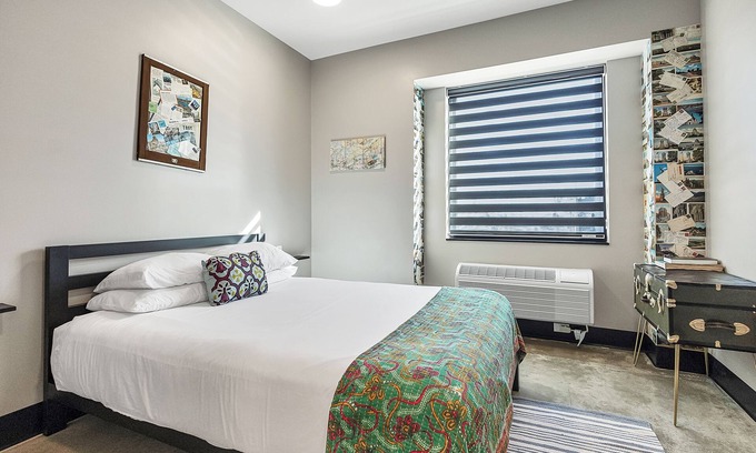 Pacific Hotel | Family suite with private kitchenette in boutique hotel with onsite activities