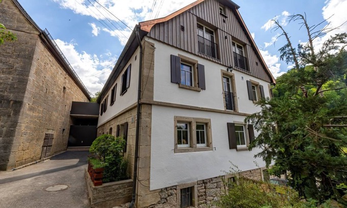 Kirchberg an der Jagst House | Farmhouse idyll meets home design - whirlpool, sauna and fireplace