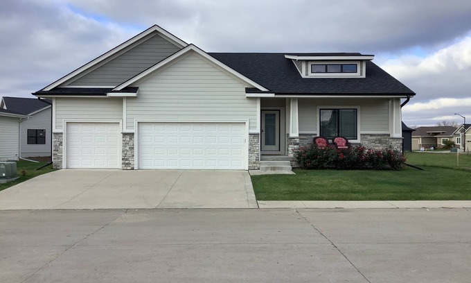 Johnston Villa | Farmhouse style Villa with front porch, 4 bedroom, 3 baths, and 2 living areas