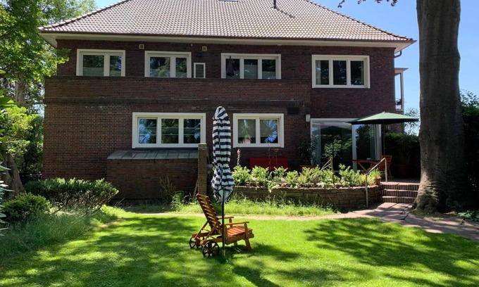 Rhauderfehn Apartment | Ferienwohnung Alte Fehnapotheke, 95144