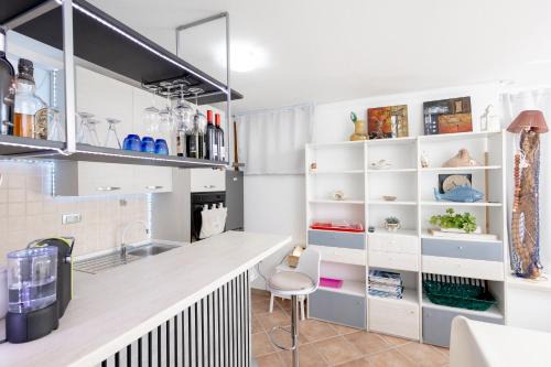 Fertilia Apartment | FERTILIA "Puntanegra Beach" Flat a 30m dal mare