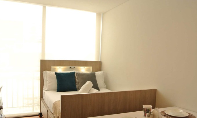 Chico Norte III Apartment | FH ~ Bright studio with balcony. Modern & central.