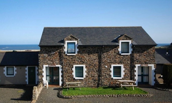 Embleton Cottage | FIDRA, pet friendly, with a garden in Embleton
