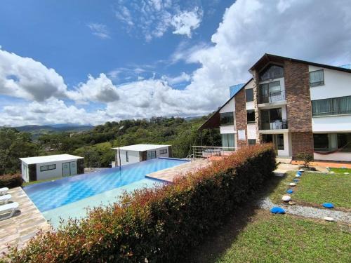 Moniquira Hotel | Finca Hotel Posada La Riviera