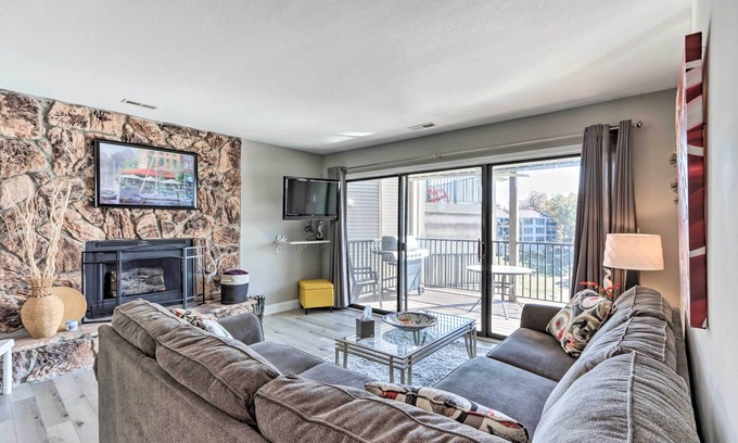 Lake Ozark Condo | Fireplace & Grill: Bright Lake Ozark Condo!