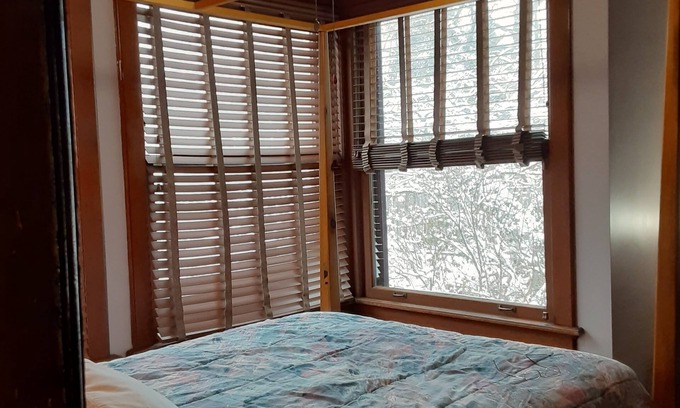 Downtown Toledo House | First Floor 4 poster Double Bed in Historic Victorian Bed and Breakfast