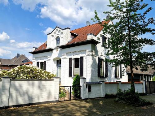 Buderich Apartment | Fischer Villa von 1875 - Kuscheliges Appartment im Grünen