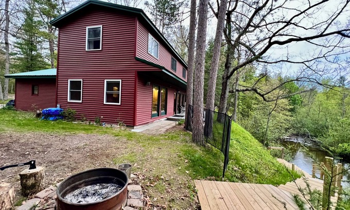 Baldwin Cottage | Fishermen's riverside oasis with fishing dock. Pet friendly.