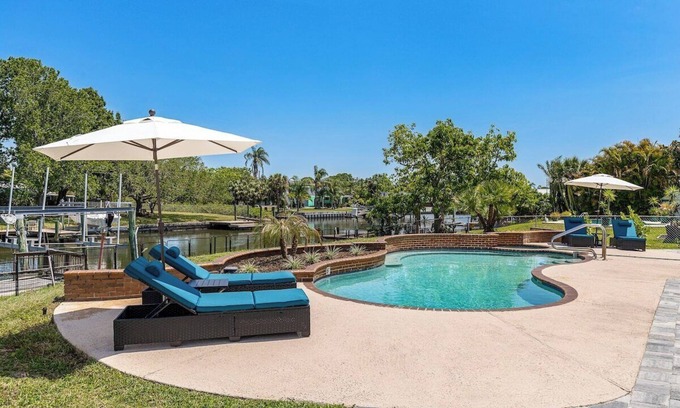 Bay Crest Park House | Flagstone · Waterfront ~ Pool ~ Game Room