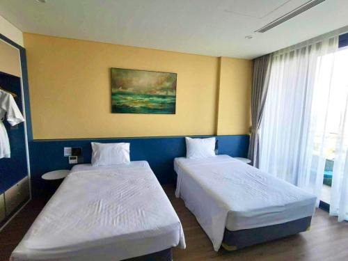 Hoang Hoa Apartment | Flamingos Hải Tiến - Tầng cao