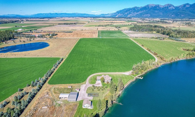 Kalispell House | Flathead River frontage, river access, firepit.