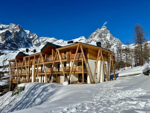 Cervinia Apartment | FLORA ALPINA EXPERIENCE - "Ski-to-Door" Brand New Chalet Apartments with Indoor Garage and Mountain View