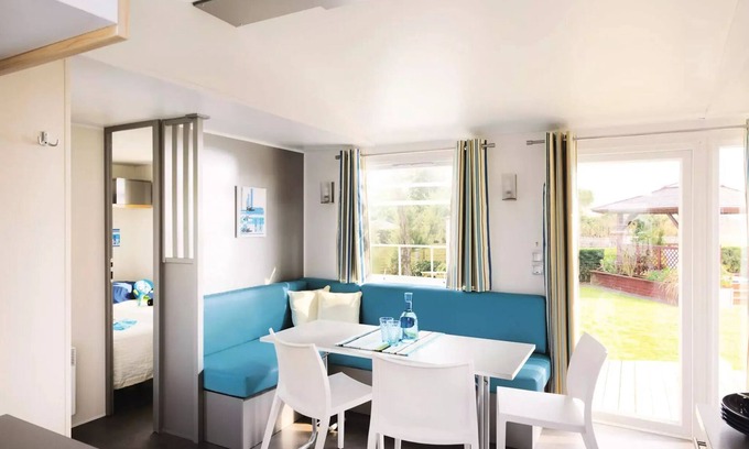 Treignac House | Flower Camping La Plage * - Mobil home Comfort 31m2 (3 bedrooms) + TV + semi-covered terrace of 18 m2 8 people