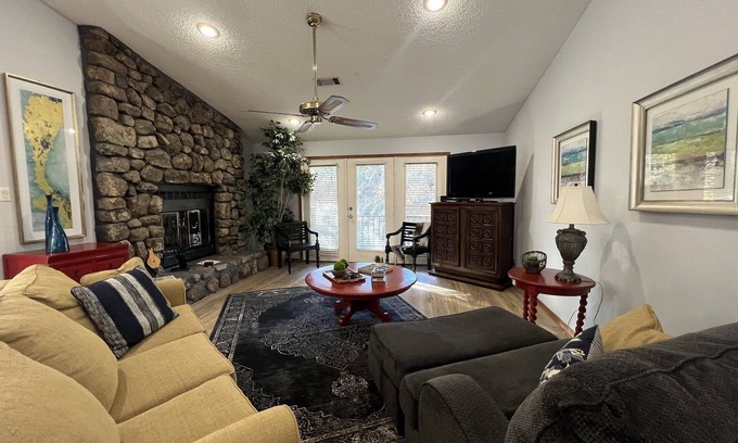 Mount Ida Condo | Forest view, log-sided two bedroom, two bath condo on Lake Ouachita. by RedAwning