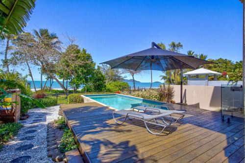 Wongaling Beach Apartment | Frangipani Place - Absolute Beachfront