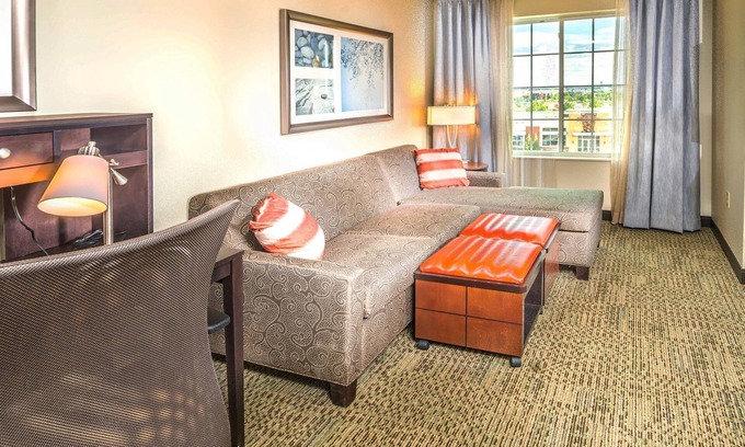 Northfield Apartment | Free Breakfast Buffet & Pool Access. Near University of Colorado Hospital.