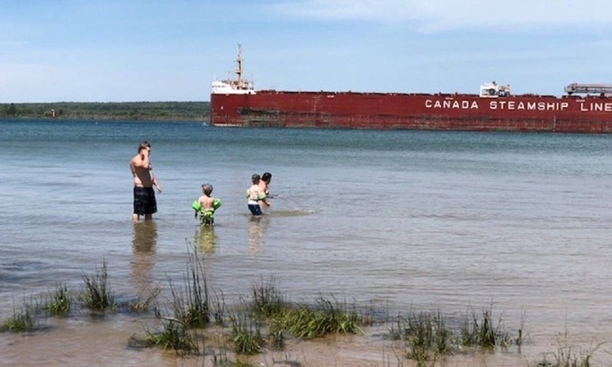 Sault Ste. Marie House | Freighters in front yard! Private Sandy Beach - Large Deck - Best View on River