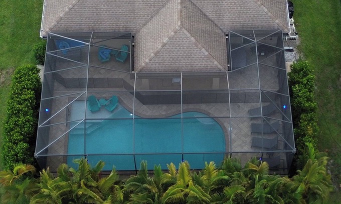 Eisenhower House | Ft Myers-Lehigh Acres/Saltwater Electric Heated Pool + 3 Waterfalls/Hot Tub