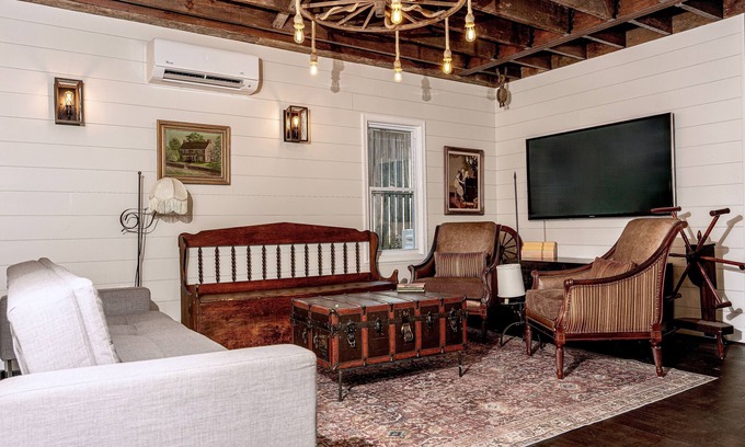 Cleveland Park House | Fully renovated 1800s Carriage House seamlessly blends history w/modern luxury.