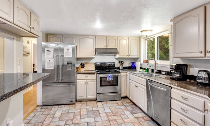 Langley House | Getaway with large deck, play area, enclosed yard & game room - near Lone Lake