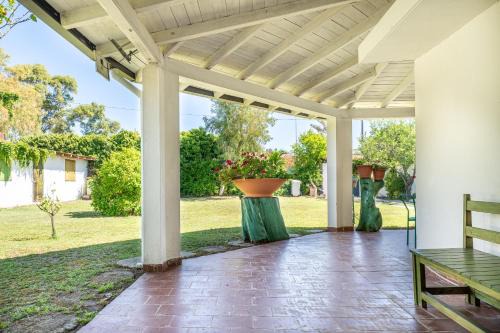 Su Forti House | Giardino del Melograno