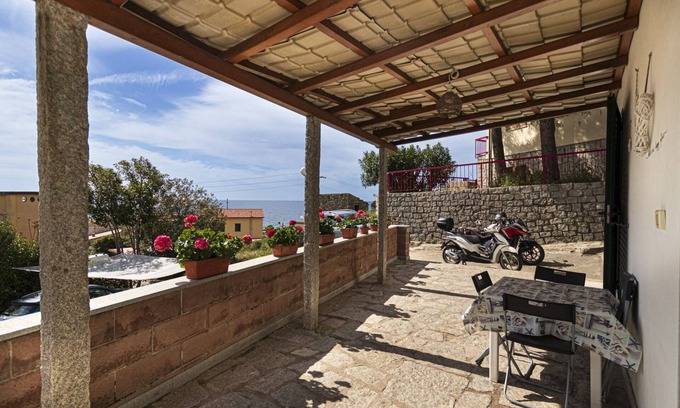 Seccheto Apartment | Ginevra Apartment in Seccheto, with equipped porch with splendid sea view, close to the center and t