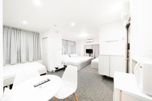 Minamikoiwa Apartment | GLOU Koiwa Tokyo - Economic APT in a Japanese Local Shopping Street, with Direct Access to Shinjuku & Akihabara