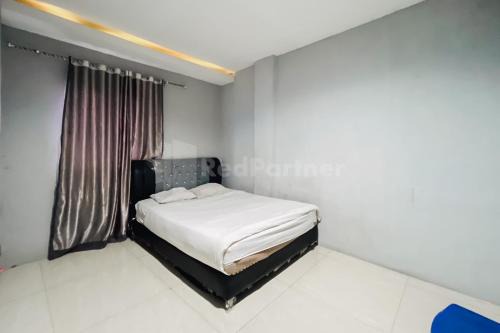 Medan Hotel | Golden Ritz Homestay Medan Mitra RedDoorz