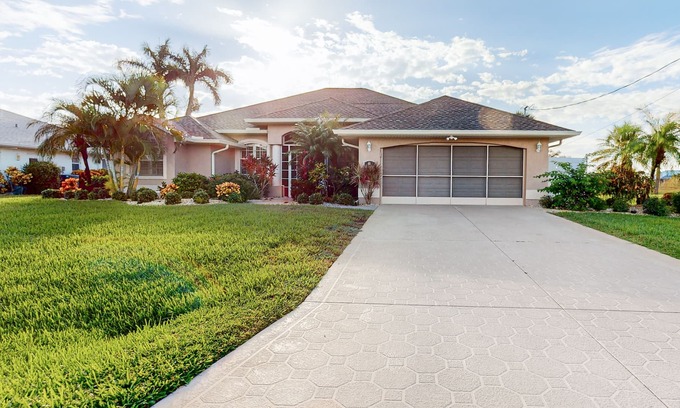 Long Meadow House | Golf course-view retreat with a private, heated pool, lanai, AC, & washer/dryer