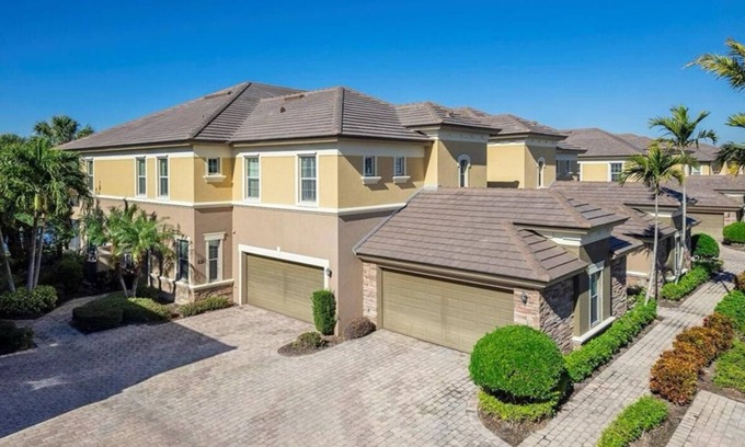 Naples House | Golf/Lake View 2 Bed+Den Coach Home In Amenity Rich Community, the Quarry!
