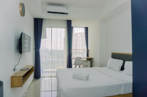 Pinang Apartment | Good Deal and Homey Studio Pacific Garden Apartment By Travelio