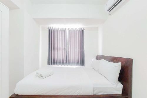 South Tangerang Apartment | Good Price and Homey 2BR at Loftvilles City Apartment By Travelio