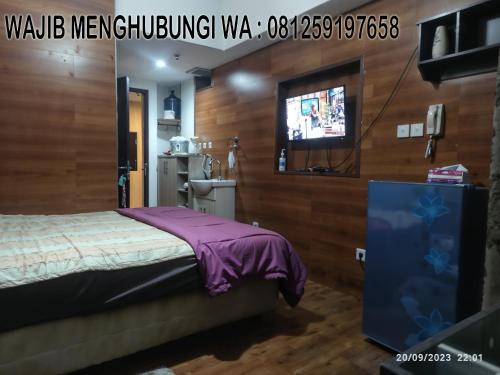 Bekasi Timur Apartment | Grand Dhika Apartement by 2325 Studio room with cozy wooden style room