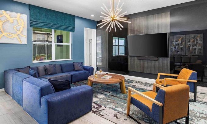 Loughman House | Grand Villa Near Disney w/Fuzzy Monster & Dino BRs, Arcade, Theater & Spa Pool
