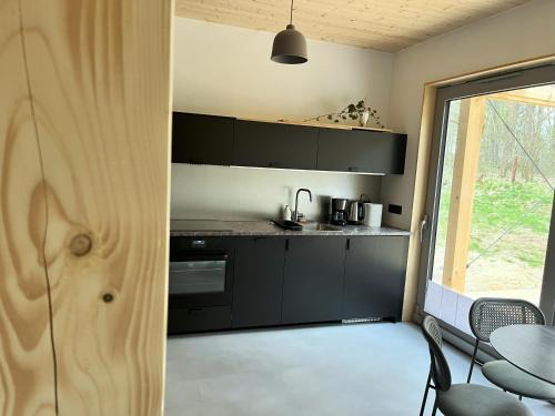 Linia Apartment | GRANIASTE - niezależne apartamenty w lesie