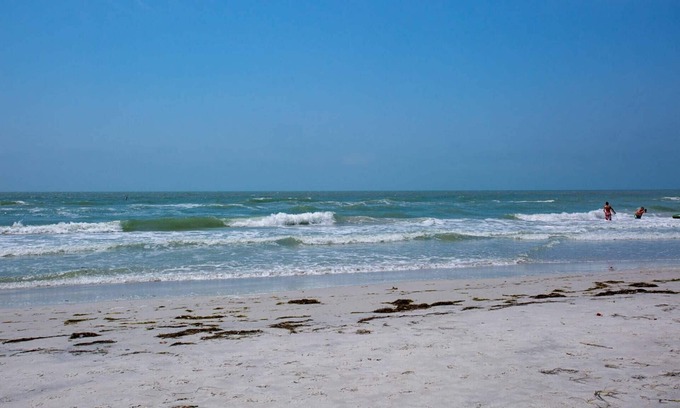 Redington Beach Condo | Great Value! Steps to Beach - Large Patio Area ~ Heated Pool ~ Free Parking - Ground Floor Condo
