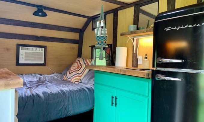 Monticello RV Rental | Groovy Vintage RV In the Woods
