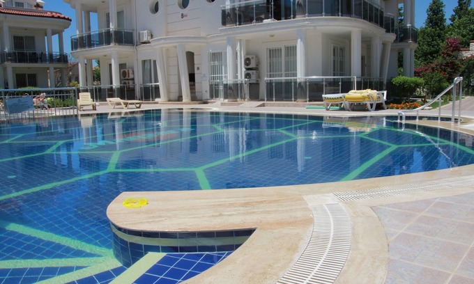 Fethiye City Center Apartment | Ground Floor Apartment on a private complex with gardens and swimming pool