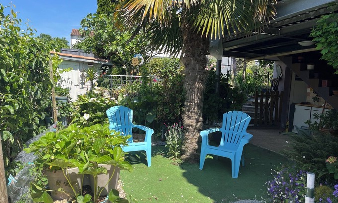 Royan Apartment | Ground floor of house with garden and barbecue; 900m from beach