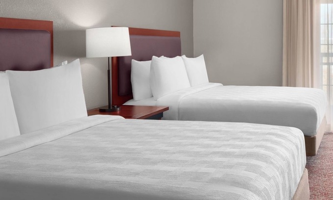 The East Side Hotel | Group Comfort – Homey Suite w/Kitchen, Living Area & Free Airport Shuttle