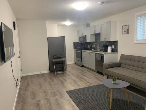 Regina Apartment | Guest Suite with Queen Bed -Home Away from Home